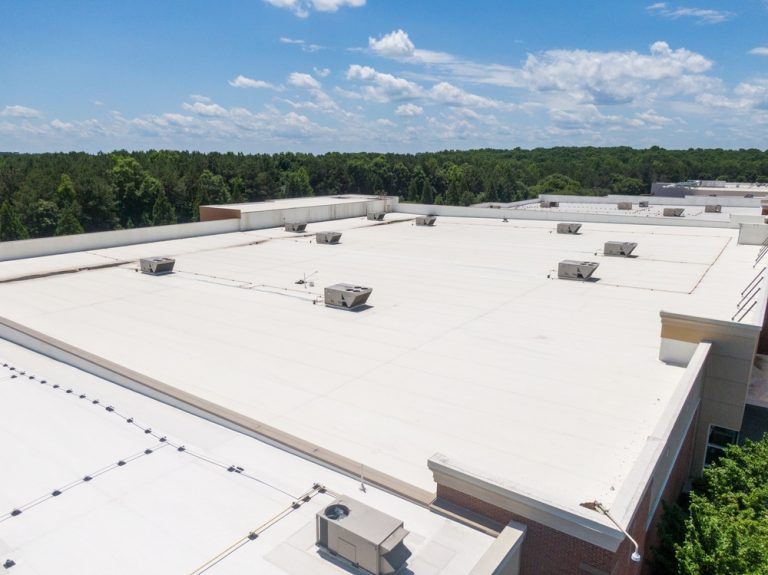 Mid,Day,Drone,Images,Of,Commercial,Roofs,Featuring,Tpo,And